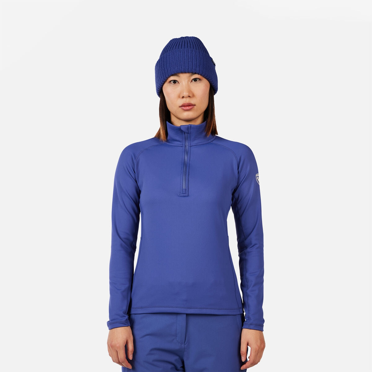 Rossignol Mid Layer Stretch Womens Hz 2026 mid layer -- front view on model showing mid layer insulation