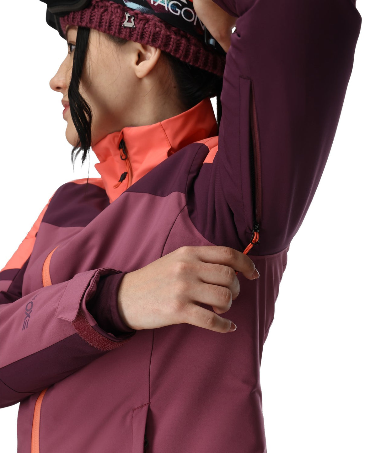 Spyder Andorra Womens Jacket 2026 ski jacket -- Acai colorway back view showing articulated powder skirt and fit