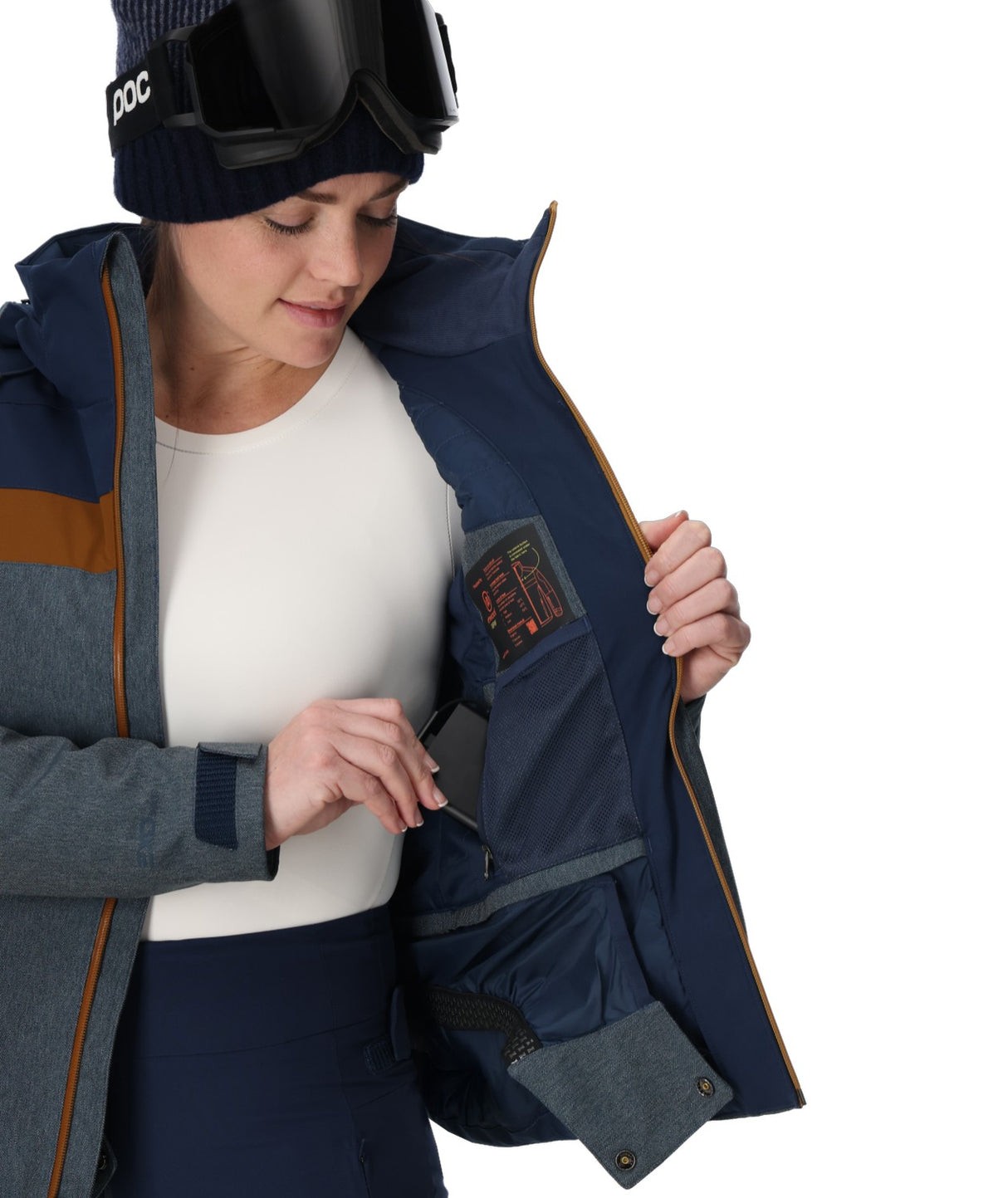 Spyder Lightning Electric Womens Jacket 2026 ski jacket -- True Navy colorway front view on model with hood and cuffs