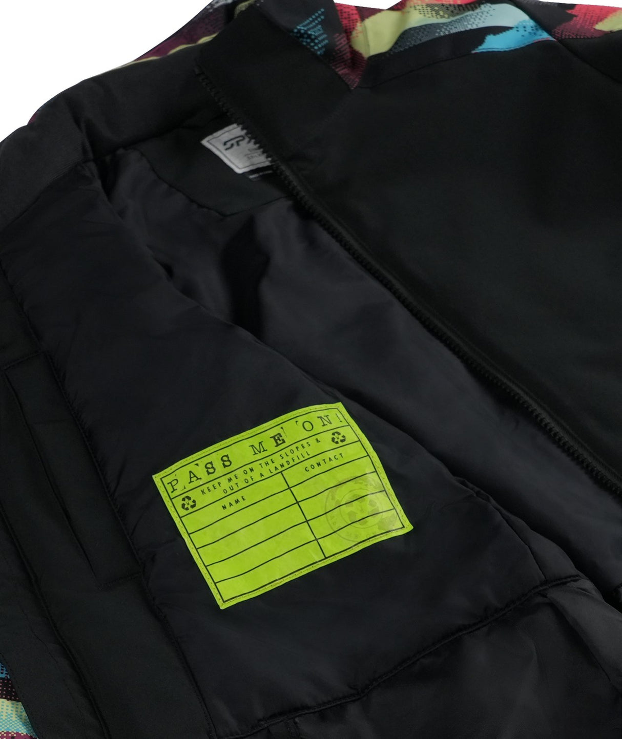 Spyder Mila Junior Jacket 2026 ski jacket -- Black colorway back view showing articulated powder skirt and fit