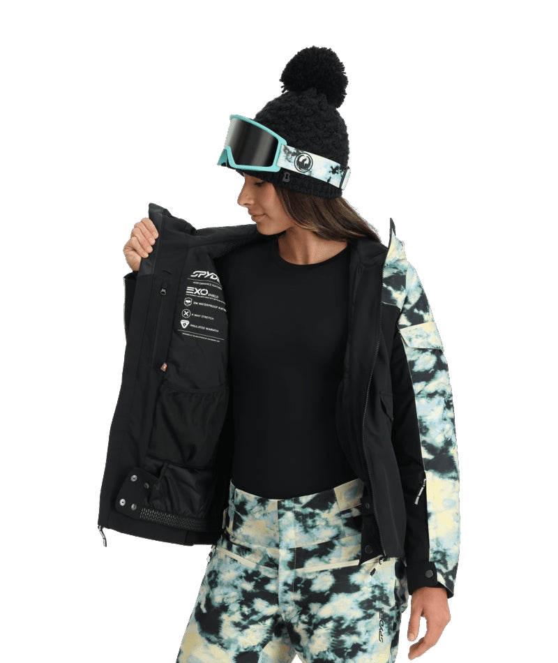 Spyder Optimist Womens Jacket ski jacket -- Black colorway front view on model with hood and cuffs