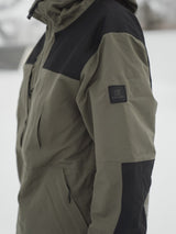 Armada Bergs Mens Jacket ski jacket -- Olive colorway outside profile showing zippered pockets and seams