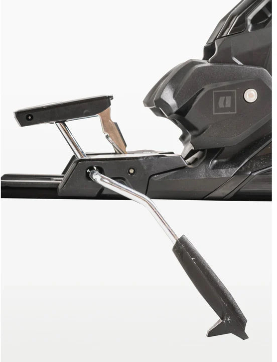 Armada Strive 14 GW ski bindings, side view close-up of the heel lifter and the silver brake arm on the black binding. Available at Willi's Ski Shop.