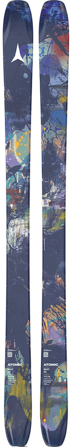 Atomic Bent 90 skis, top view of the pair standing on end with a colorful abstract paint graphic in navy, blue and orange.