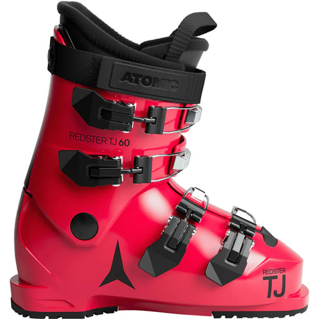 Atomic Redster TJ 60 junior ski boot in bright red with black buckles, side view showing the Atomic logo and the TJ 60 label.