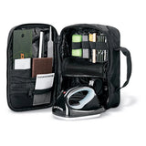 Dakine Super Tuning Kit, open view of the black bag showing the file guides, brushes and wax iron stored inside. Come in to Willi's Ski and Board.
