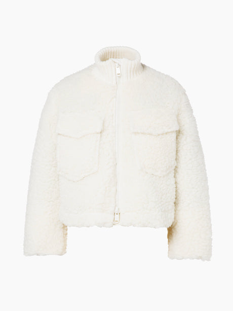 Goldbergh Justine women's jacket in white faux shearling with two chest pockets and a high collar, front view with a zip front.