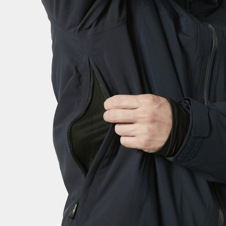 Helly Hansen Courchevel Mens Jacket 2026 ski jacket -- Navy colorway back view showing articulated powder skirt and fit