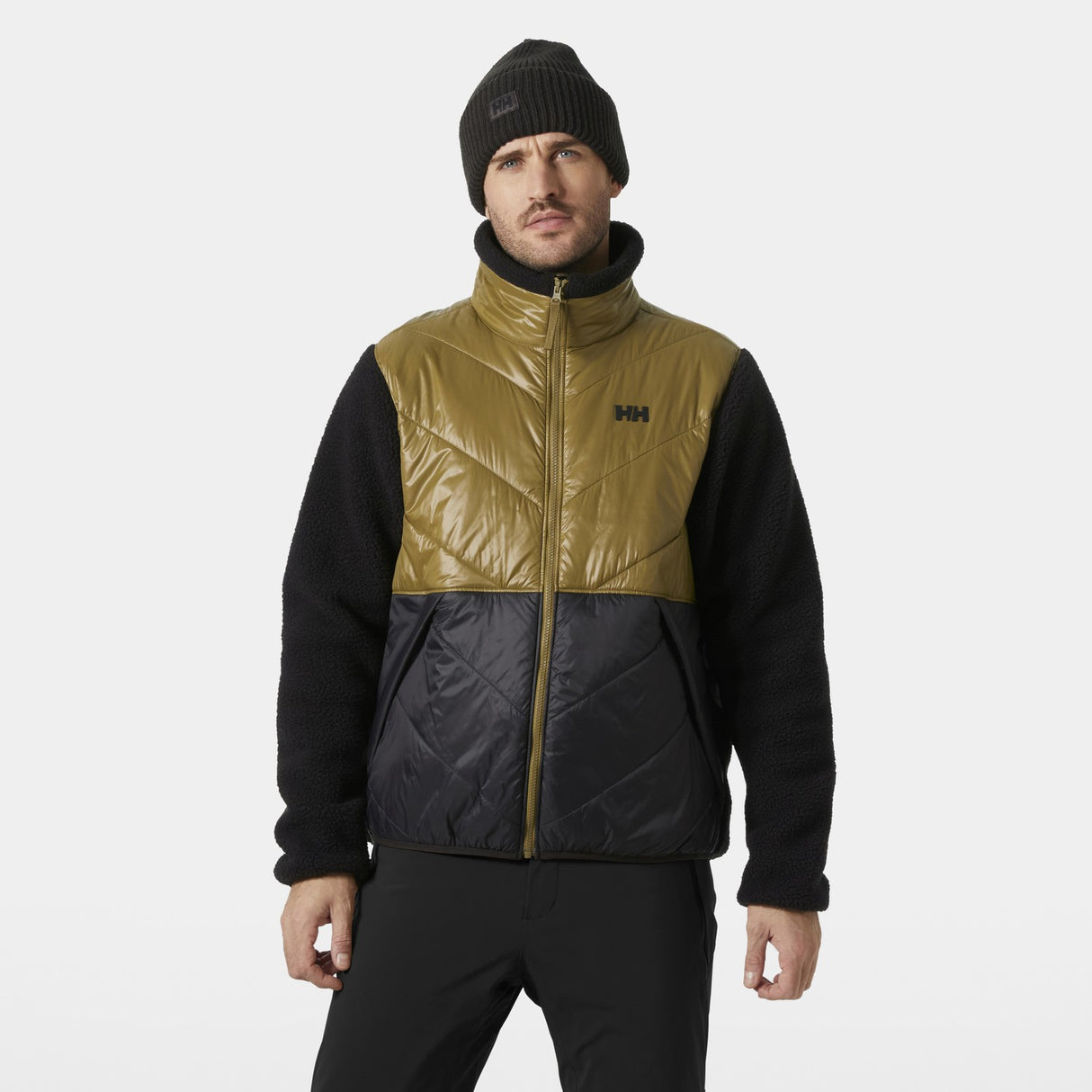 Helly Hansen Village Hybrid Mens Jacket 2026 ski jacket -- Sepa colorway outside profile showing zippered pockets and seams