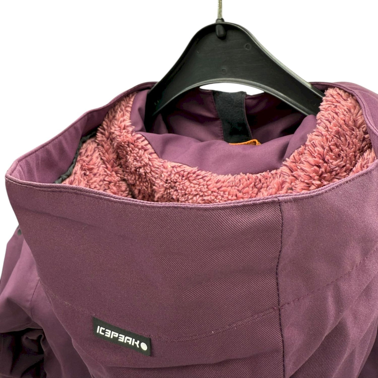 Icepeak Cathay Womens Jacket ski jacket -- Dark Purple 770 colorway outside profile showing zippered pockets and seams