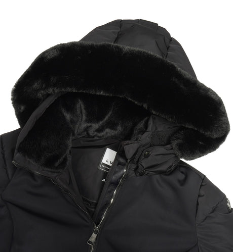 Luhta Salmivaara Womens Jacket 2026 ski jacket -- Basic Black colorway front view on model with hood and cuffs