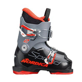 Nordica Speedmachine J2 junior ski boot in black, gray and red, side view showing two buckles and the Nordica name on the shell.