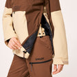 Oakley Tnp Tbt Womens Anorak Jacket ski jacket -- Hummus colorway back view showing articulated powder skirt and fit