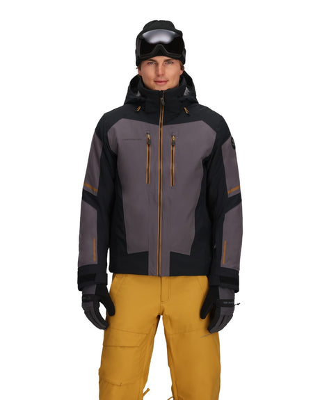 Obermeyer Charger Mens Jacket 2026 ski jacket -- Basalt colorway front view on model with hood and cuffs