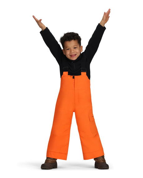 Obermeyer Volt Toddler Bib 2026 ski pant -- Just Orange 5 colorway side view showing side zip ventilation