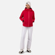 Rossignol Blackside Womens Jacket ski jacket -- Ruby Red colorway front view on model with hood and cuffs