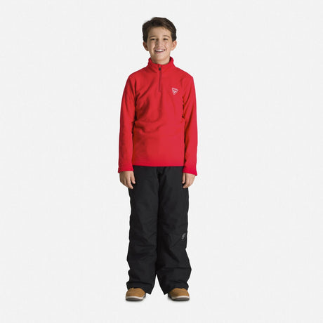 Rossignol Boys Half Zip Fleece mid layer -- Sports Red 8 colorway front view on model