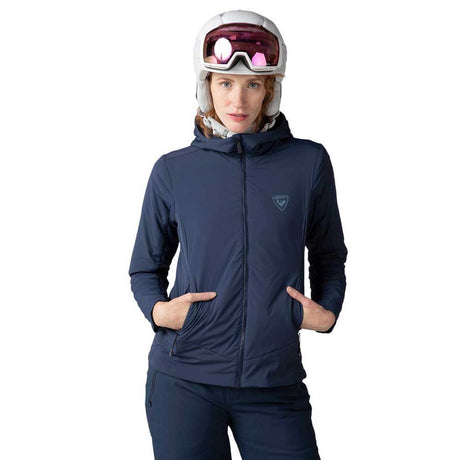 Rossignol Opside Womens Jacket 2024 ski jacket -- Dark Navy colorway back view showing articulated powder skirt and fit