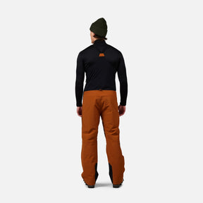 Rossignol Outerlimits Mens Bib 2026 ski pant -- Deep Caramel colorway front view on model