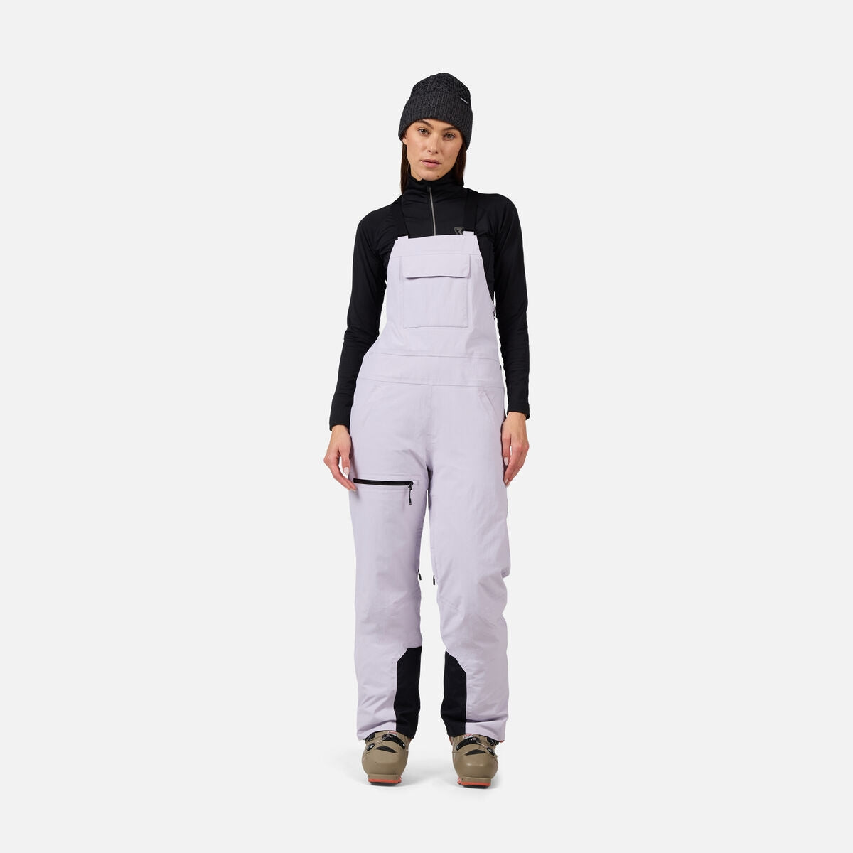 Rossignol Outerlimits Womens Bib 2026 ski pant -- front view on model showing insulated ski pant at Willis Ski and Board