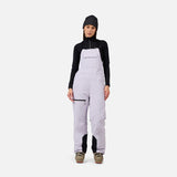 Rossignol Outerlimits Womens Bib 2026 ski pant -- front view on model showing insulated ski pant at Willis Ski and Board
