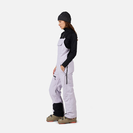 Rossignol Outerlimits Womens Bib 2026 ski pant -- Galactic Lilac colorway front view on model