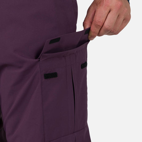 Rossignol Relax Mens Pant ski pant -- Mulberry colorway side view showing side zip ventilation