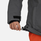 Rossignol Strawpile Junior Jacket ski jacket -- Onyx Grey colorway back view showing articulated powder skirt and fit