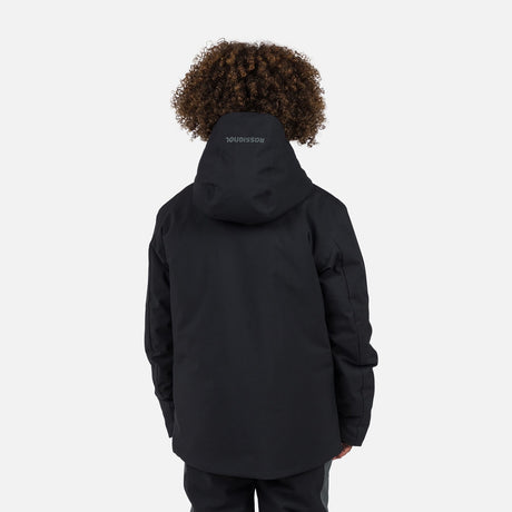 Rossignol Strawpile Junior Jacket 2026 ski jacket -- Black colorway front view on model with hood and cuffs