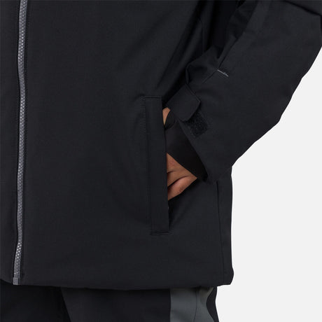 Rossignol Strawpile Junior Jacket 2026 ski jacket -- Black colorway front view on model with hood and cuffs