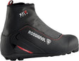 Rossignol XC2 Tour cross-country boot in black and red, side view of the touring boot with the Rossignol name and a red heel stripe.