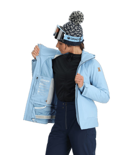 Spyder Cascade Womens Jacket ski jacket -- Blue Drift colorway front view on model with hood and cuffs