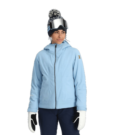 Spyder Cascade Womens Jacket ski jacket -- Blue Drift colorway back view showing articulated powder skirt and fit