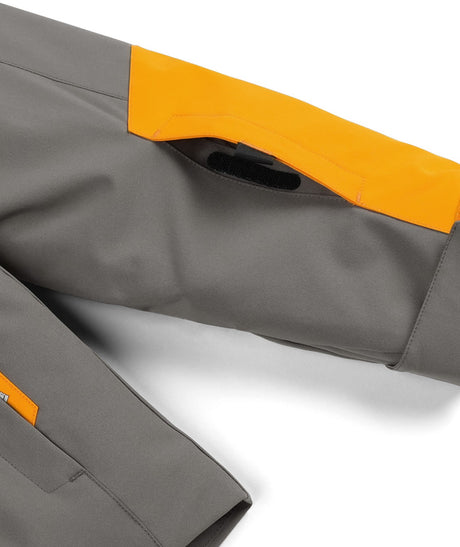 Spyder Challenger Junior Jacket 2026 ski jacket -- Storm colorway back view showing articulated powder skirt and fit