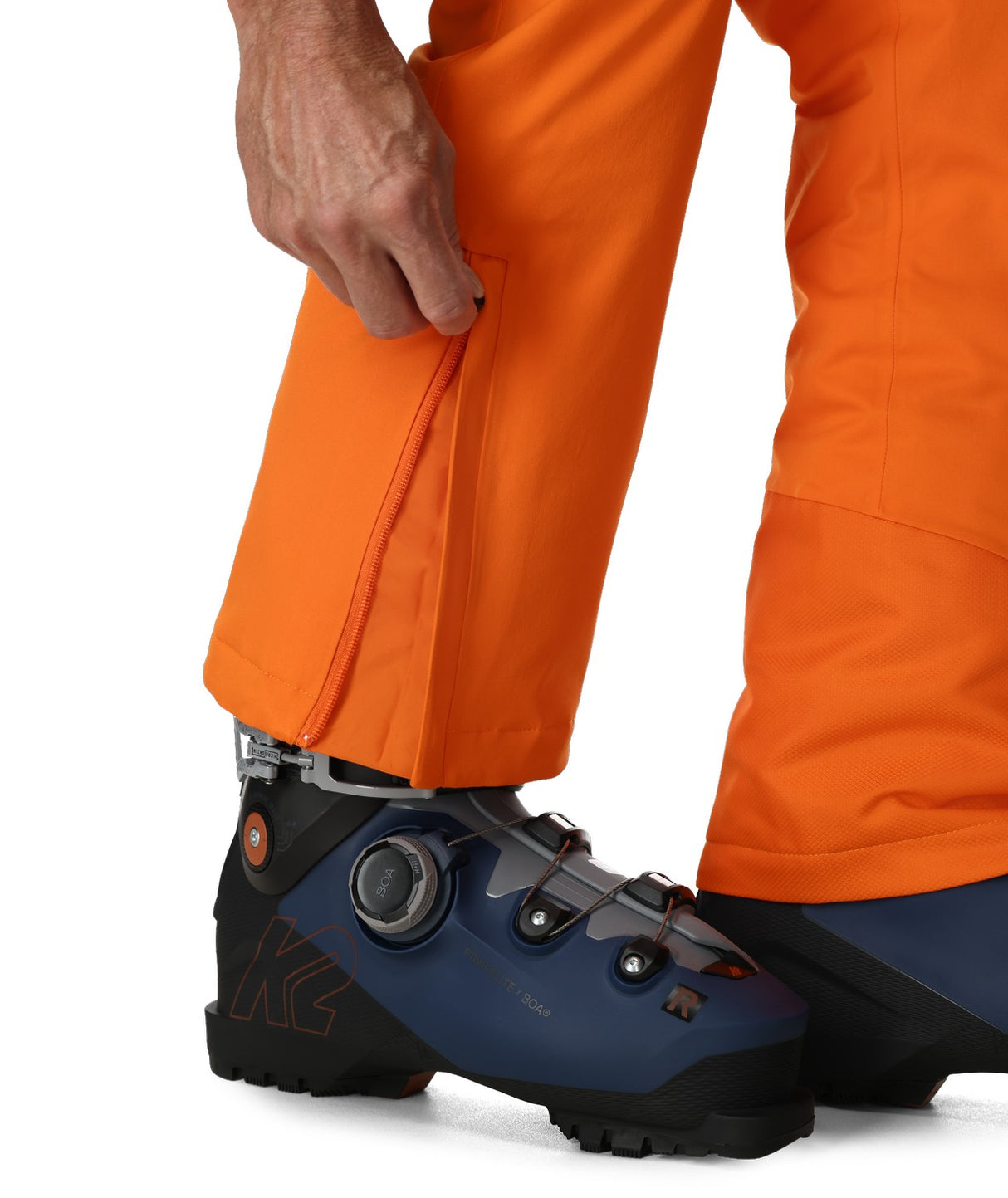 Spyder Dare Mens Pant 2026 ski pant -- Flash Orange colorway side view showing side zip ventilation