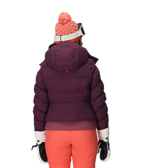 Spyder Haven Womens Jacket 2026 ski jacket -- Plum colorway front view on model with hood and cuffs