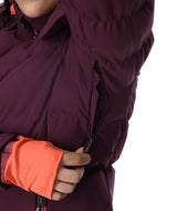 Spyder Haven Womens Jacket 2026 ski jacket -- Plum 4 colorway back view showing articulated powder skirt and fit