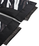 Spyder Olympia Juinor Pant ski pant -- Tiger Polar colorway boot gaiter and cuff detail