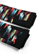 Spyder Olympia Junior Pant 2026 ski pant -- Mountain Print colorway front view on model