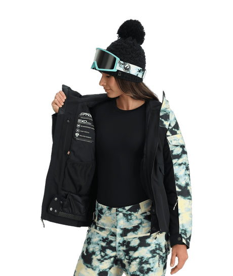 Spyder Optimist Womens Jacket ski jacket -- Black colorway front view on model with hood and cuffs