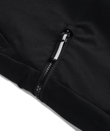 Spyder Propulsion Junior Pant ski pant -- Black 8 colorway boot gaiter and cuff detail