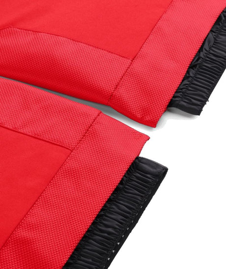 Spyder Propulsion Junior Pant ski pant -- Spyder Red colorway boot gaiter and cuff detail