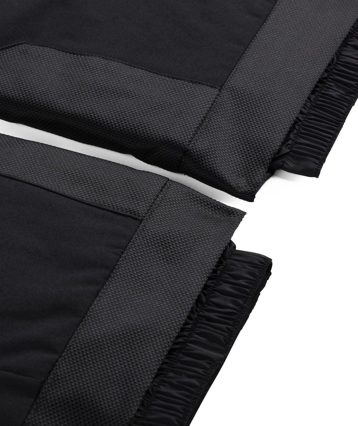 Spyder Propulsion Junior Pant 2026 ski pant -- Black colorway side view showing side zip ventilation