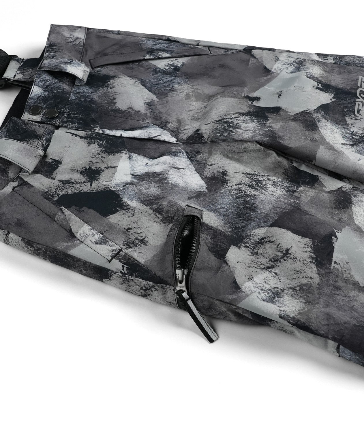 Spyder Propulsion Junior Pant 2026 ski pant -- Black Camo 8 colorway boot gaiter and cuff detail