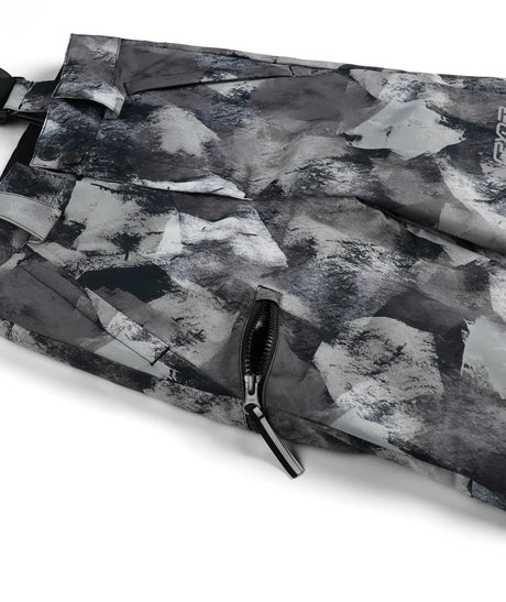 Spyder Propulsion Junior Pant 2026 ski pant -- Black Camo 8 colorway boot gaiter and cuff detail