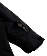 Spyder Slash Junior Jacket ski jacket -- Black colorway back view showing articulated powder skirt and fit