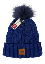 Willis Sophie Hat Jr accessories -- front view of Willis branded junior pom beanie hat