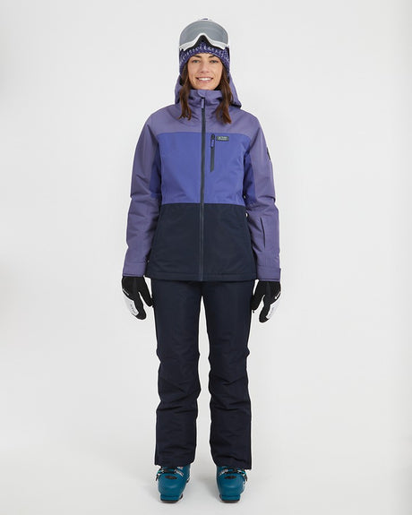 Xtm Nexe Womens Jacket 2026 ski jacket -- Light Dusk colorway front view on model with hood and cuffs