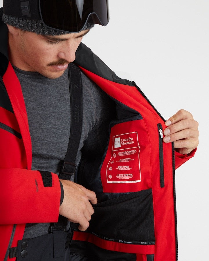 Xtm Quantum Mens Jacket 2026 ski jacket -- Crimson Red colorway outside profile showing zippered pockets and seams