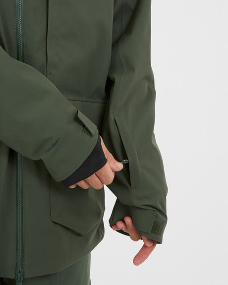 Xtm Ridge Line Mens Jacket 2026 ski jacket -- Ivy colorway back view showing articulated powder skirt and fit